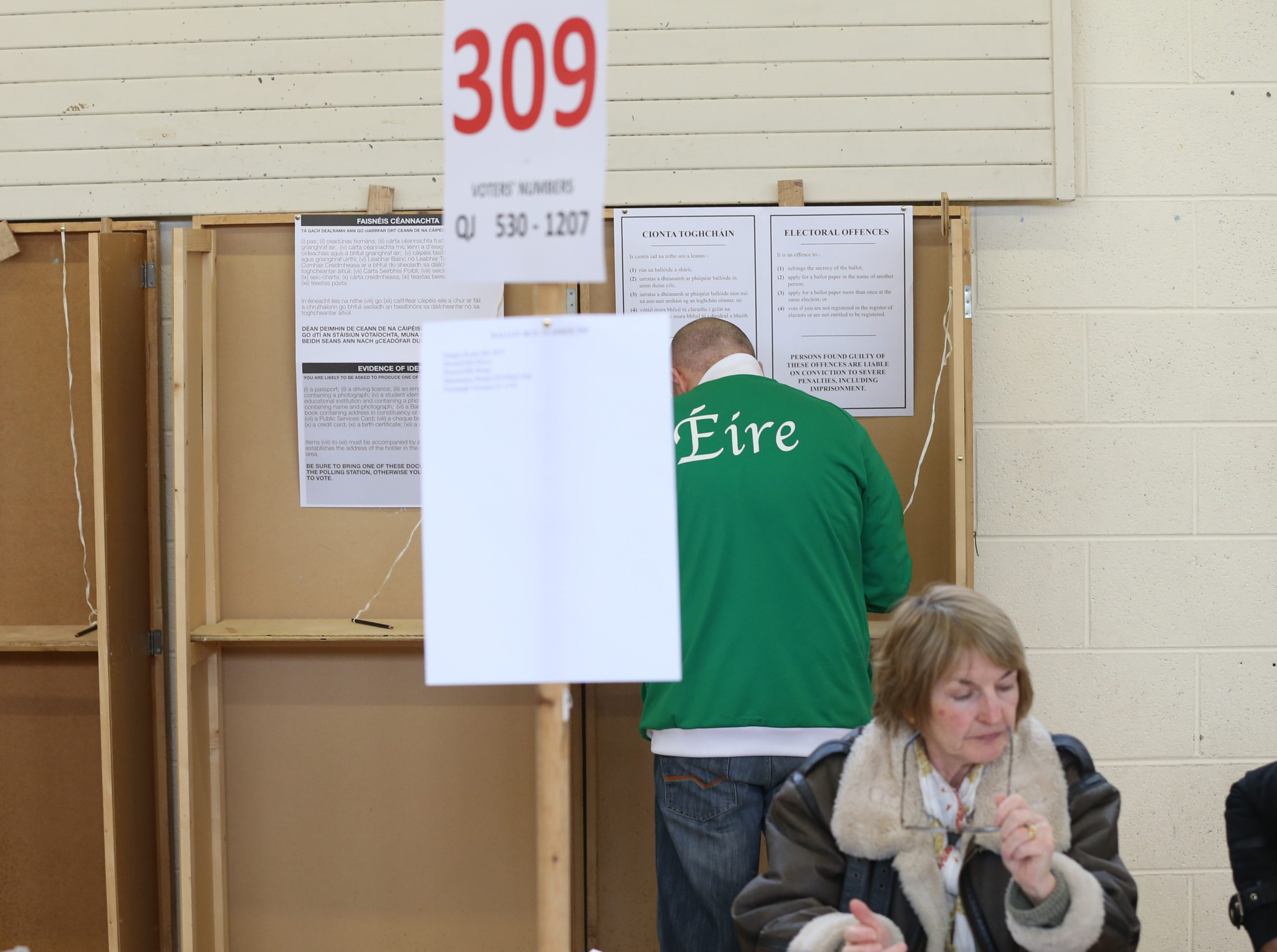 Decorative image of person voting.