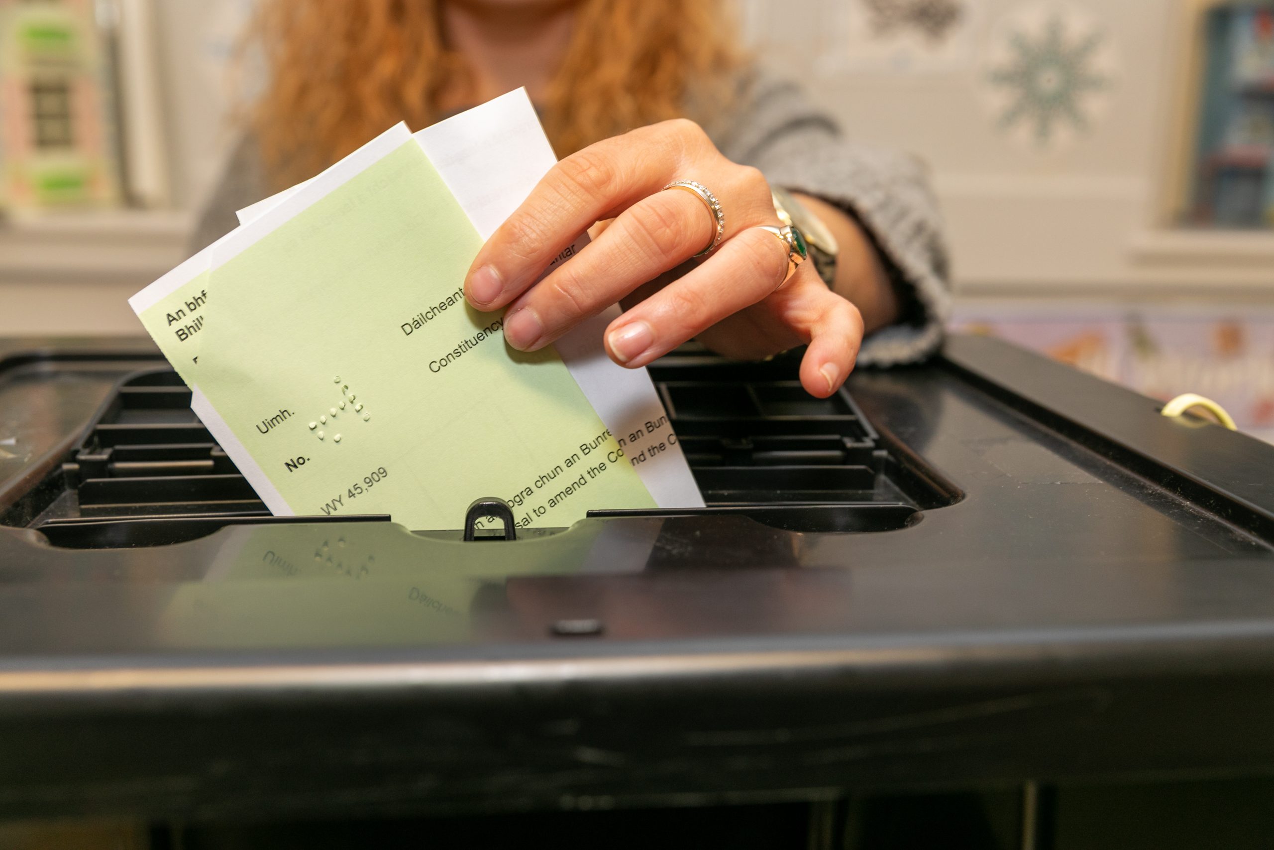 A voter casting their ballots in the Referendums vote on 8 March.